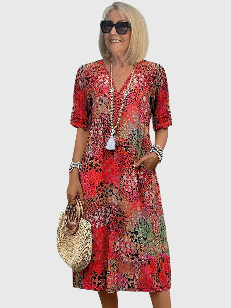 Women’s Floral Midi Dress with Flowing Silhouette and Elegant Print