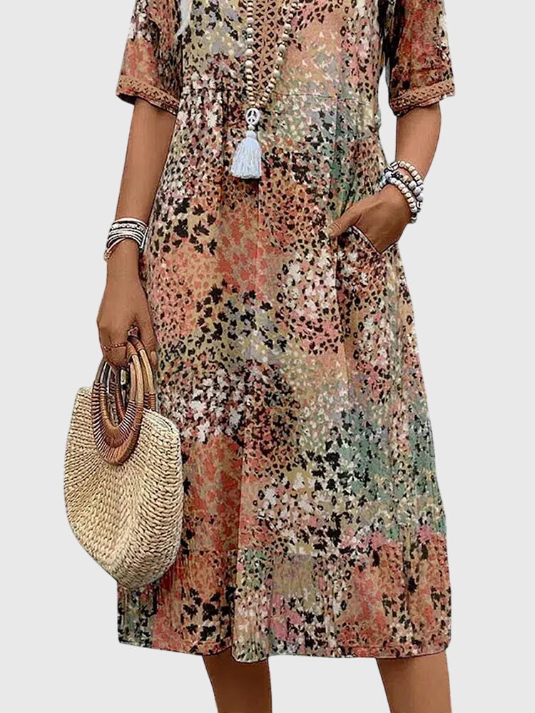 Women’s Floral Midi Dress with Flowing Silhouette and Elegant Print