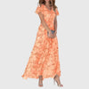 Women’s Floral Maxi Dress with Flutter Sleeves and Flowing Silhouette