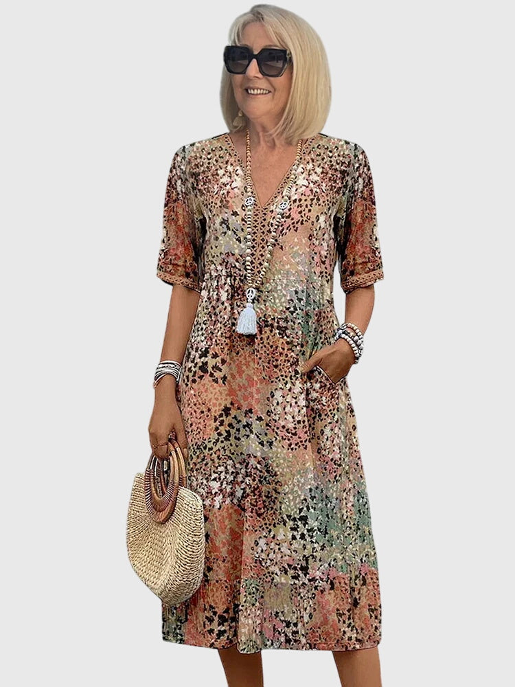Women’s Floral Midi Dress with Flowing Silhouette and Elegant Print